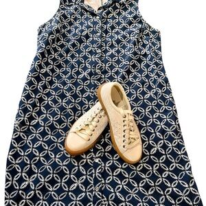 Michael Kors navy and white button-front sleeveless shirt dress.
